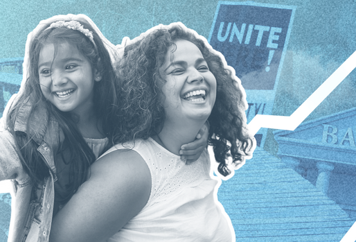 A woman carrying a child on her back