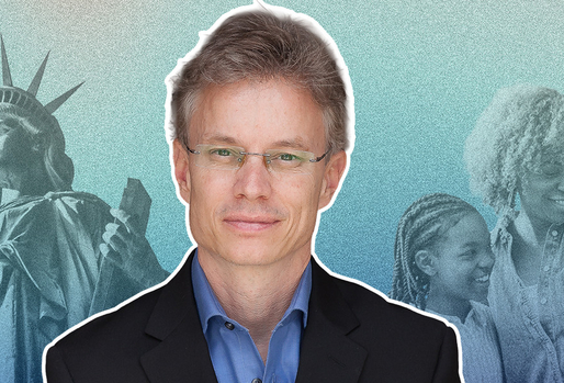 An man in a suit is featured in front of a blue background with black and white images of the statue of liberty and a family